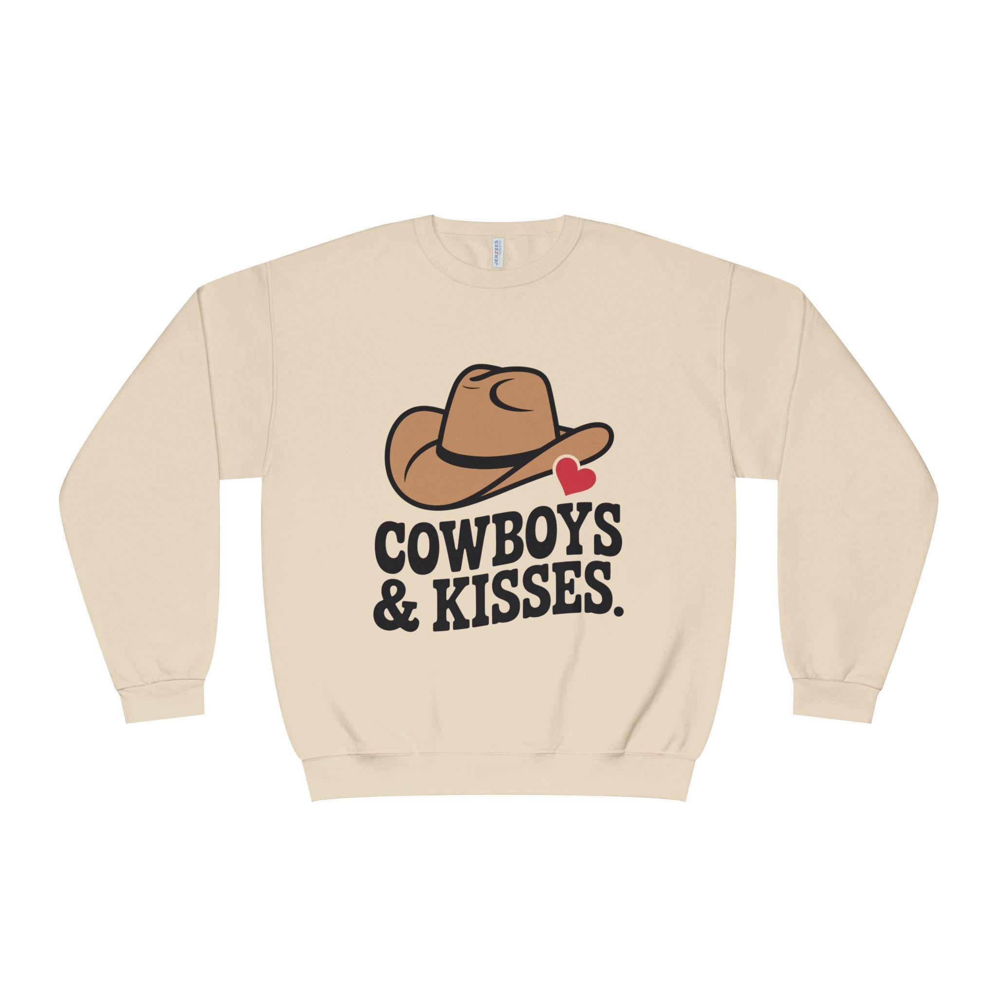 Beige sweatshirt with a cowboy hat graphic, red heart, and “COWBOYS & KISSES” text.